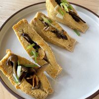 Fried tofu stuffed with mushrooms   at Wellness Sushi in Denver