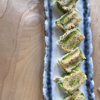 Torched pressed roll. Okay flavor. Mushy   at Wellness Sushi in Denver