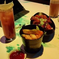 Chunky chips & Bang bang cauliflower in a sweet and spicy sauce at Inamo - Soho in London