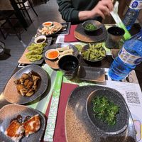 Fried vegetables, vegetable gyozas, vegetable spring rolls, mushrooms, fried tofu, edamame and wakame seaweed salad  at Yi Duo in Barcelona
