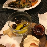 Nearly finished before I remembered to take a photo…olives, chilli, homemade hummus, chilli jam and homemade bread 😋 at 3 Pigs in Rhodes