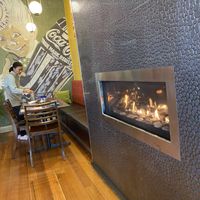 The cosy “fireplace” added atmosphere!   at 8 Sisters Cafe & Grill in Bendigo