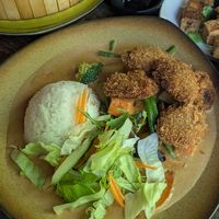 Fake chicken, peanut sauce at Comcha Vegan in Berlin