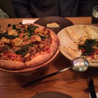 Gongbao inspired pizza and mapo tofu on hummus. at Duli in Shanghai