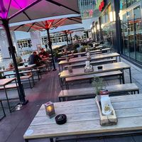 outside seating at Hans Im Glück - Mercedes Platz in Berlin