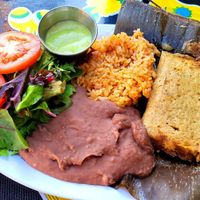 Full plate with banana leaf tamal at Flacos in Berkeley