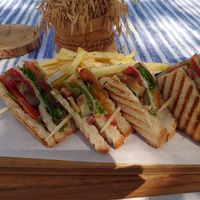 Vegan club sandwich with chips at Seacret in Zakinthos