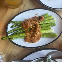 Asparagus with tomato sauce  at Shy Bird in Cambridge