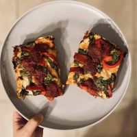 Vegan pizza with red peppers & spinach  at Satch Squared in Gainesville