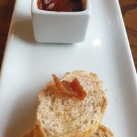 Slightly roasted bread with tomato concasse served with awazè😋 at Addis Kitchen in South East London