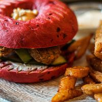 Beetroot Bagel with Falafel, Avocado, Cucumber, Tomato and Hummus - and fries at Kafe Kaspar in Torshavn