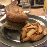 The vegan burger with a glass of Tiki sangria   at The Yard in Parga