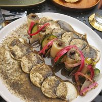 Black Aguachili, hearts of palm, mushroom, black radish, etc at La Bartola in Toronto
