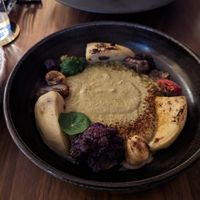 Pistachio pepian with an assortment of uncommon veg at La Bartola in Toronto