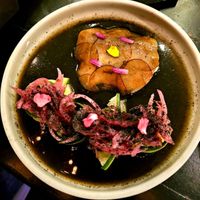 Black aguachile, hearts of palm, king oyster Mushroom, fermented black soybean, xnipec at La Bartola in Toronto