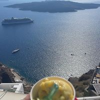 Stroll down the lanes for a view whilst you eat!  at Gelateria Zotos in Santorini