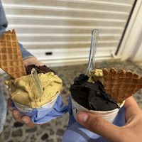 On the left: pistachio and bitter chocolate flavour. On the right: pistachio and santorini lava flavour   at Gelateria Zotos in Santorini