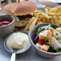 Vegan burger with vegetable patty, walnuts, fries and vegan mayo at De Beren in Leerdam