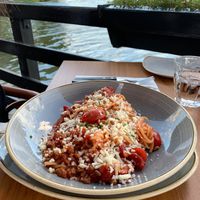 Vegan pasta bolognaise with vegan cheese  at De Beren in Leerdam