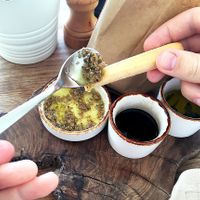 Appetizers: crispy bread, olive oil, balsamic vinegar and olive paste at Mediterraneo by the Sea in Paphos