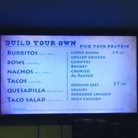 Veggies include peppers, onions, and mushrooms. All the rice and beans you want as well. And toppings after. at Nando's Burrito & Taco Shop in Fairview