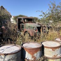 Old cars outside  at Crêperie Tati in Faro