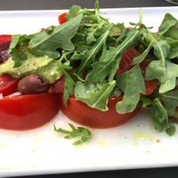 Caprese salad with Coconut burrata ( vegan and delicious ) at Aromatic Restaurant in Altafulla