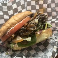 Smash burger with added onions and mushrooms  at The Hwy Cafe in Pemberton