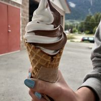 Chocolate vanilla swirl soft serve in waffle cone  at The Hwy Cafe in Pemberton