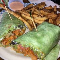 Tiger Wing Buffalo Wrap with fries 😋😍 was unbelievably delicious  at The Green Pig Pub in Salt Lake City