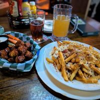 Vegan wings and vegan disco fries at The Green Pig Pub in Salt Lake City