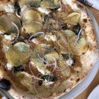 The PATATE 2.0 pizza. If you love roasted garlic u will love this!  at Pizzeria Grano in Vancouver