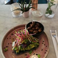 Asian inspired avocado toast with a side of button mushrooms at Starfish & Coffee in Enfield