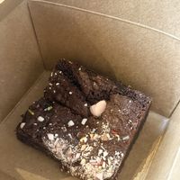 Mini egg brownie (gf)  at How On Earth in Exeter