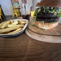 The superfood vegan burger next to a dish of fried chips  at Submarine Burger in Rijeka