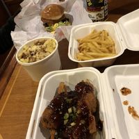Our feast ft. Refugees welcome sticker ✊🏼  at Really Happy Chicken in Brighton