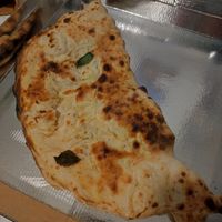 Calzone Contadino (vegan mozzarella, fried aubergines, courgettes and peppers) at Spicchi d'Autore in Naples