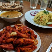 Spicy chips, tandoori roti, vegan Biriani with Biriani sauce (all marked as vegan on the menu) at Panshee in Swansea
