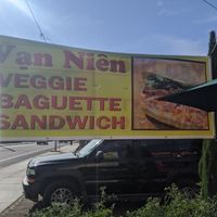 Sign on Foster at  Van Nien Vegan Baguette Food Coffee Tea in Portland