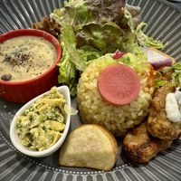 Meal Set featuring stew, Chinese yam wrapped in rice paper, house made “egg”, baked nuggets, salad, and more … 100% vegan and 100% delicious!  at Vegeto LIKO in Sendai