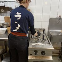 Almost an event kitchen as you can watch them prepare everything while sitting around the kitchen   at Ramen Ya in Nantes