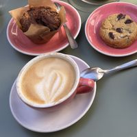 Chocolate & banana muffin with coconut, chocolate chip cookie with sea salt, cappuccino with oat milk.  at Café Albertine in Rennes