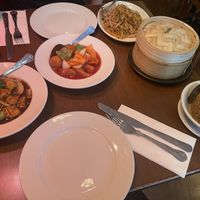 Shitake fried rice, s&s prawn, gyozas, noodles, general tso’s tofu  at The Orchid Vegan Restaurant in York