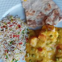 Combined on the plate pilau rice, tandoori roti, mango curry veg. at Tandoori Hut in Tenerife