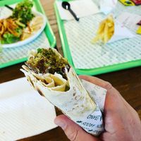 delicious garlic falafel wrap with parsely, beets, onions and tomatoes in there at Aroos Lebanon in Sousse