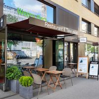 Exterior and outdoor seating at Weera Pura in Zurich