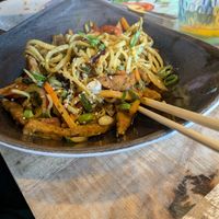 Curry with Udon noodles and tempeh at Osorio World's Kitchen in Ameland