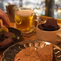 Pita, chips and black bean hummus at Meu Nota in Tokyo