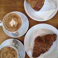 Oat flat white and cornetti at Espresso Bar in Berlin