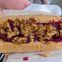 Vegan hot dog and bin with onions and cabbage at IKEA in Loanhead